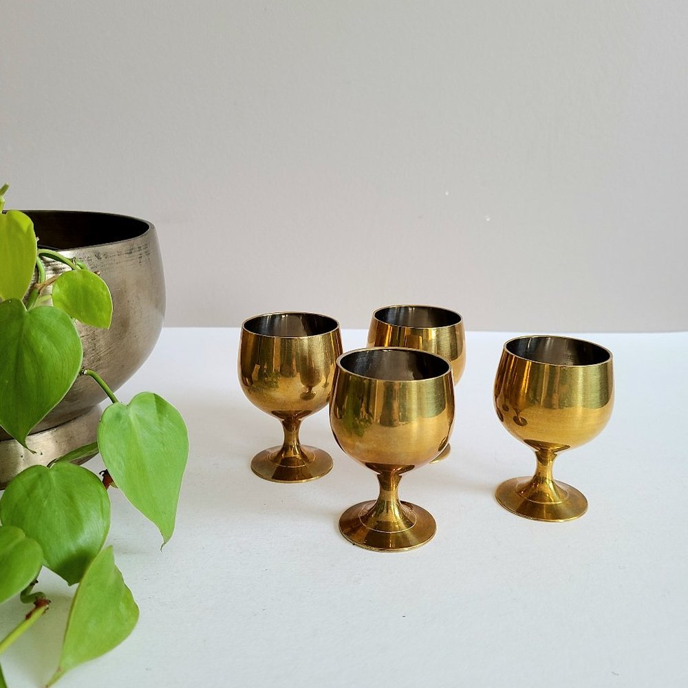 Set of 4 brass vine goblets.